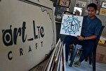 Malasia: Artesano talla madera con temas del Corán