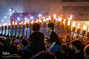 عکس | آیین مشعل‌گردانی شب تاسوعا‎ در مشهد